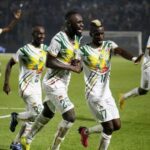 Soccer Football - Africa Cup of Nations - Group E - Mali v South Africa - Stade Amadou Gon Coulibaly, Korhogo, Ivory Coast - January 16, 2024 Mali's Lassine Sinayoko celebrates scoring their second goal with Falaye Sacko REUTERS/Luc Gnago