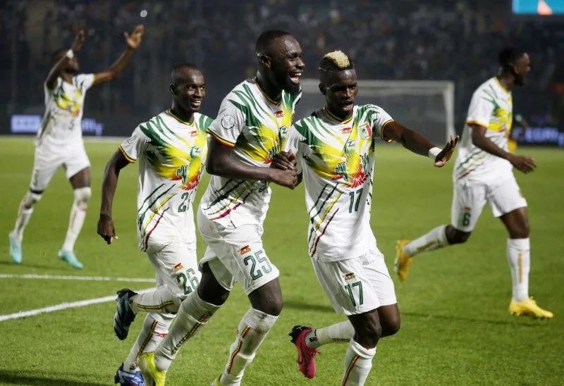 Soccer Football - Africa Cup of Nations - Group E - Mali v South Africa - Stade Amadou Gon Coulibaly, Korhogo, Ivory Coast - January 16, 2024 Mali's Lassine Sinayoko celebrates scoring their second goal with Falaye Sacko REUTERS/Luc Gnago
