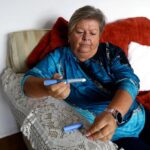 Kim Gradwell begins the Ozempic injection at her home in Dudley, North Tyneside, Britain