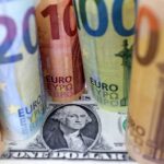 U.S. Dollar and Euro banknotes are seen in this illustration taken July 17, 2022. REUTERS/Dado Ruvic/Illustration/File Photo