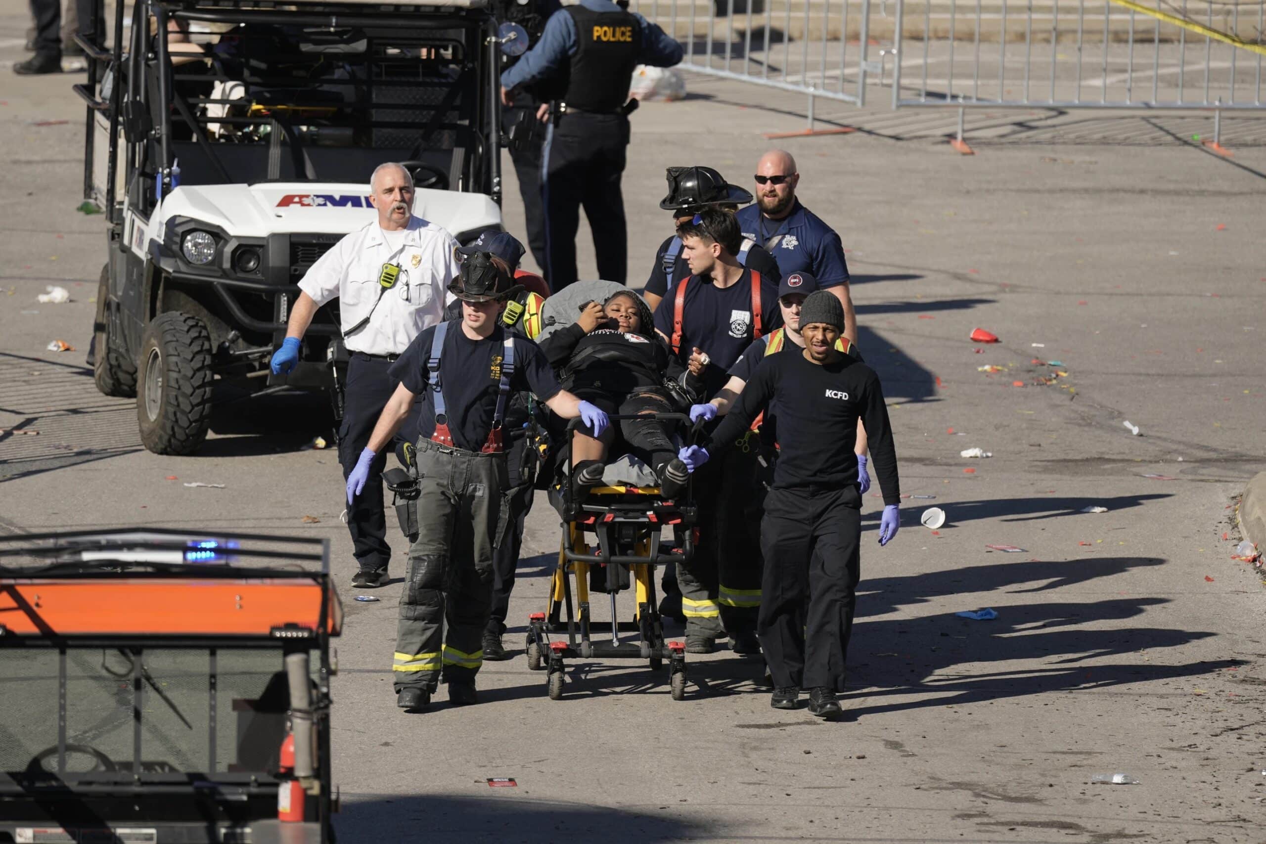 A person is taken to an ambulance after an incident following the Kansas City Chiefs victory parade in Kansas City