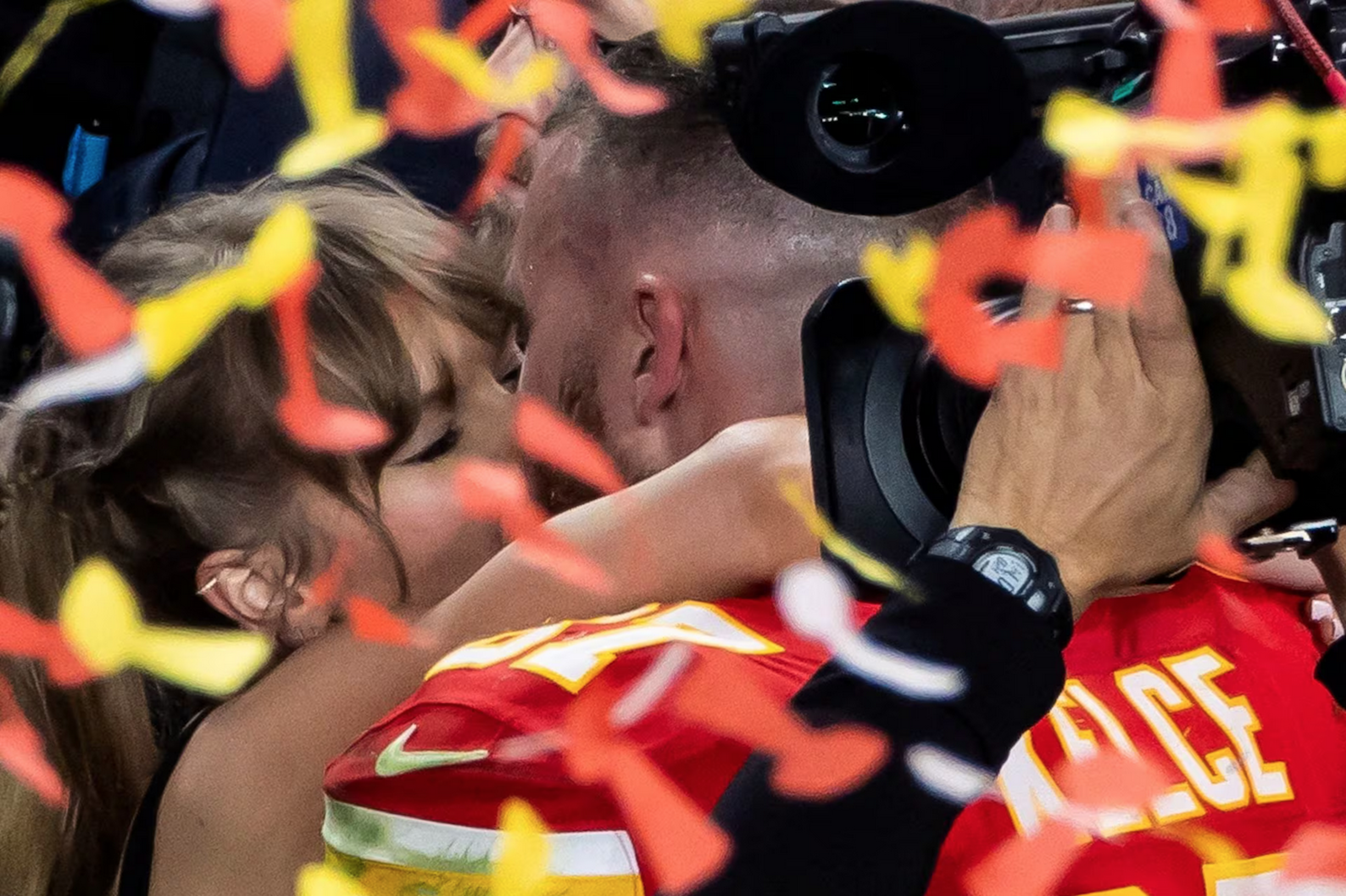 Kansas City Chiefs' Travis Kelce kisses Taylor Swift as they celebrate. REUTERS/Carlos Barria