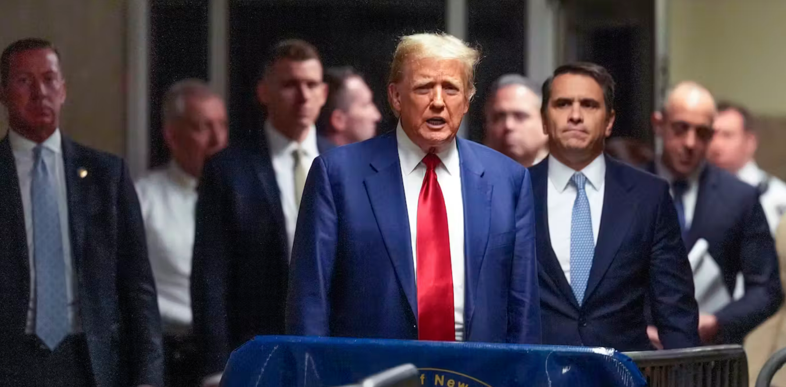 Donald Trump appears outside a Manhattan criminal court on March 25, 2024