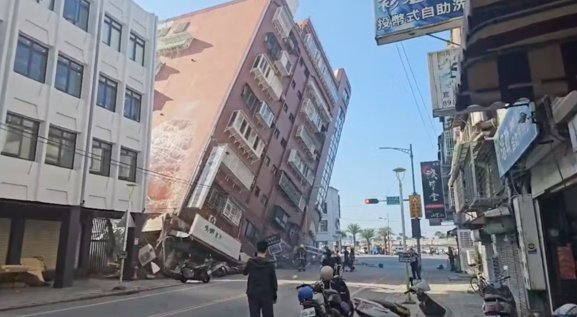 Video footage run by TVBS shows a partially collapsed building after an earthquake struck in Hualien, eastern Taiwan. TVBS via AP/AAP