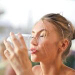 Woman drinking from glass