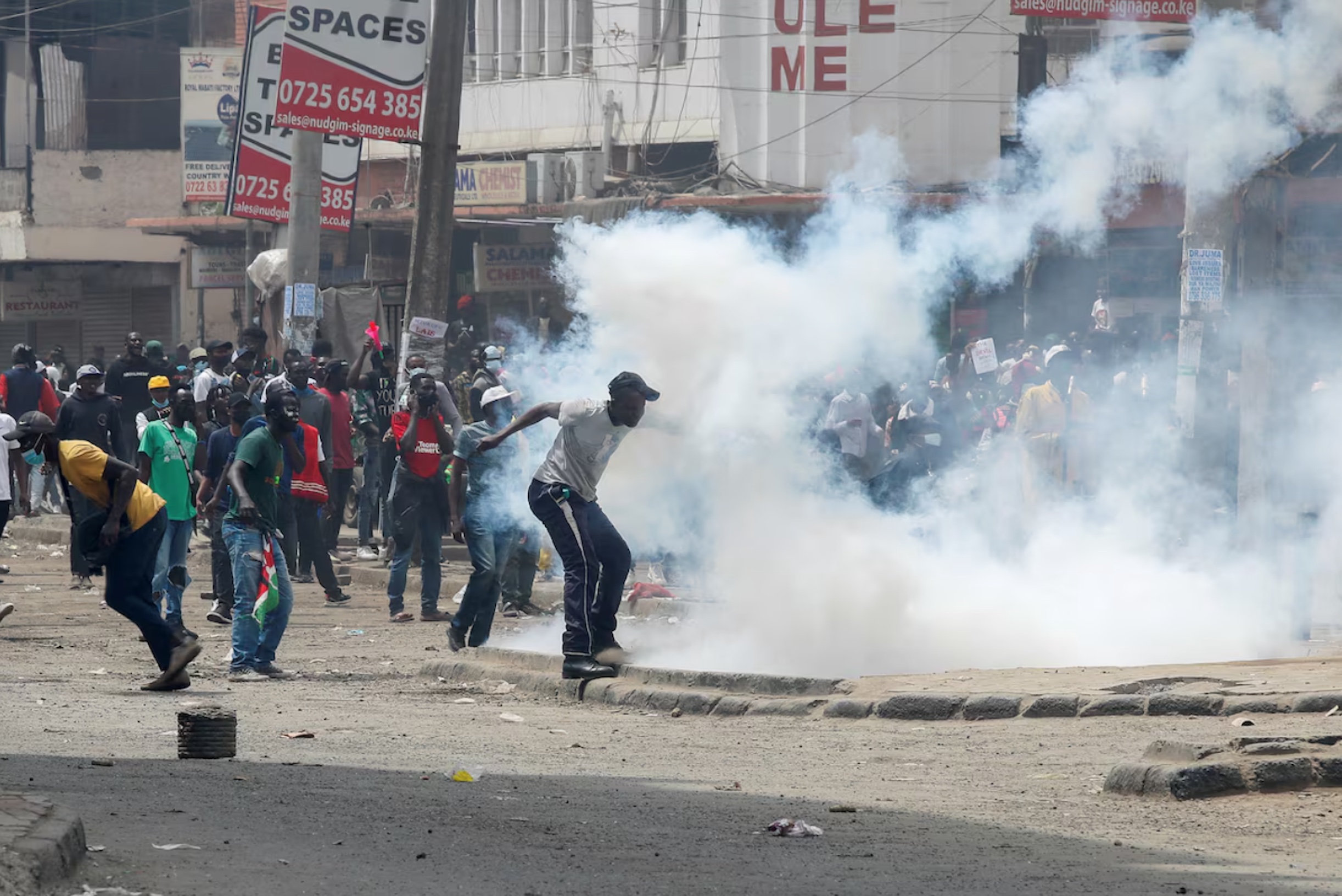 People take part in a demonstration over police killings of people protesting against the imposition of tax hikes by the government, as police use teargas to disperse them, in Nairobi, Kenya, July 2, 2024.