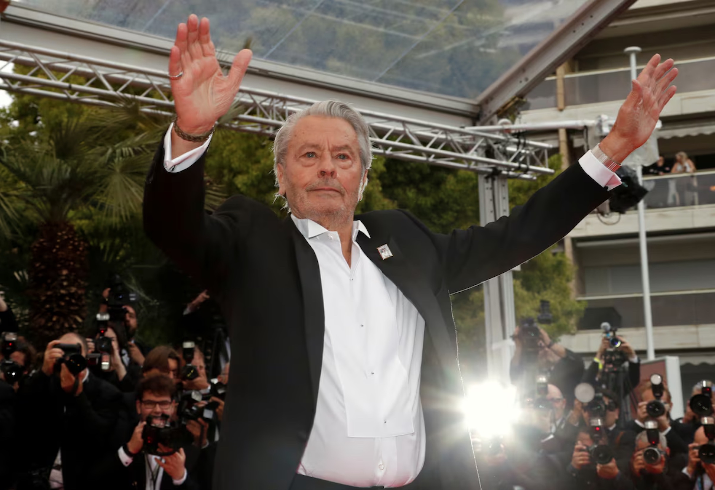 72nd Cannes Film Festival - Red Carpet Arrivals - Cannes, France, May 19, 2019. Alain Delon poses before receiving his honorary Palme d'Or Award.