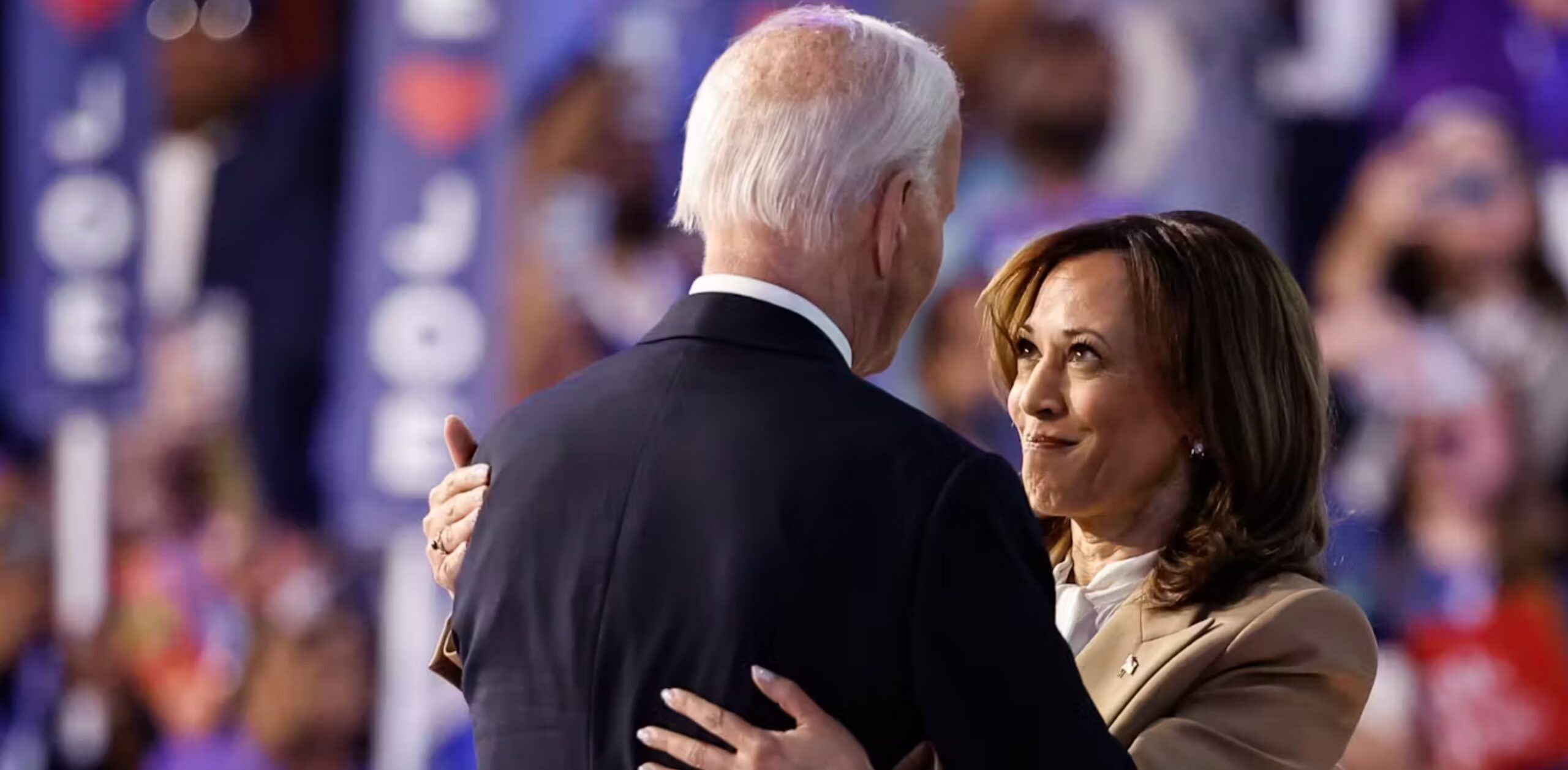 Vice President Kamala Harris greets President Joe Biden on the first day of the Democratic National Convention in Chicago on Aug. 19, 2024.