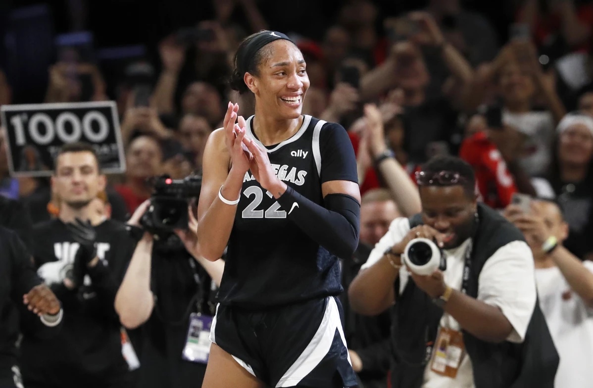 Las Vegas Aces center A’ja Wilson (22) celebrates during the second half of a WNBA basketball game against the Connecticut Sun, Sunday, Sept. 15, 2024, in Las Vegas.