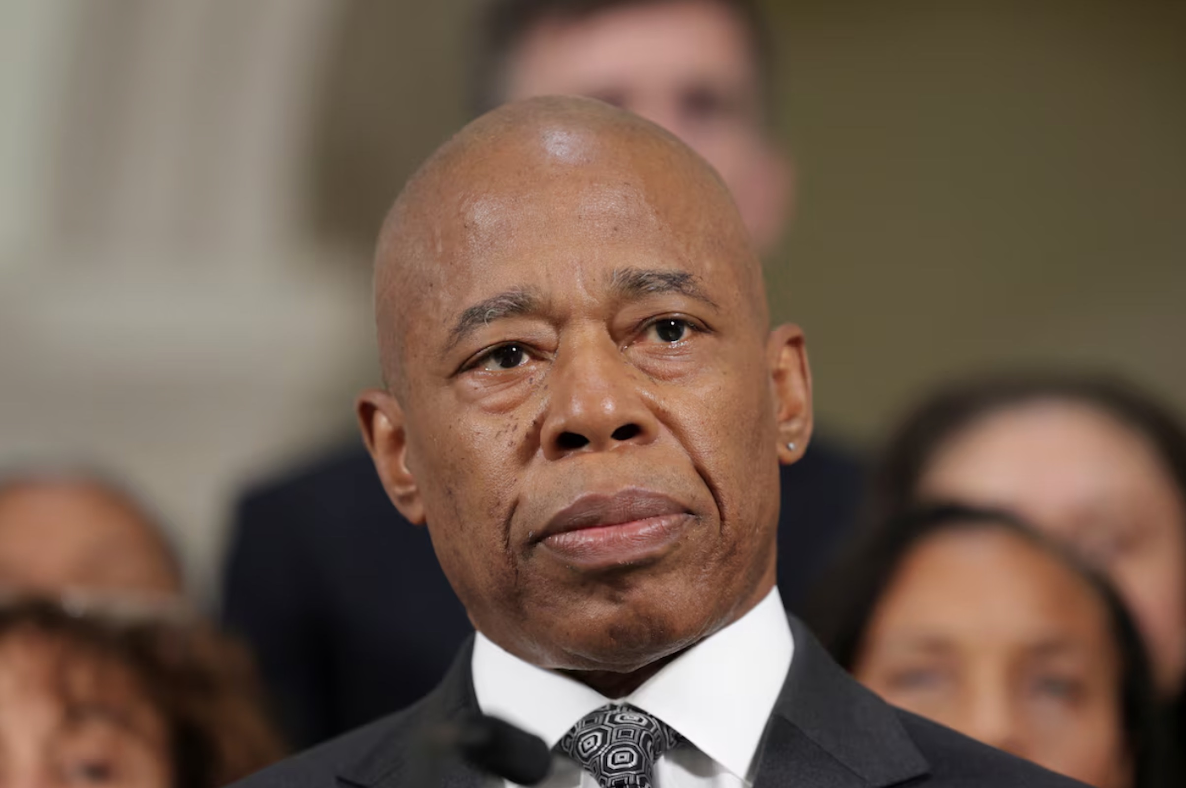 New York City Mayor Eric Adams listens to a reporter during an event in Manhattan in New York City, U.S., September 16, 2024.