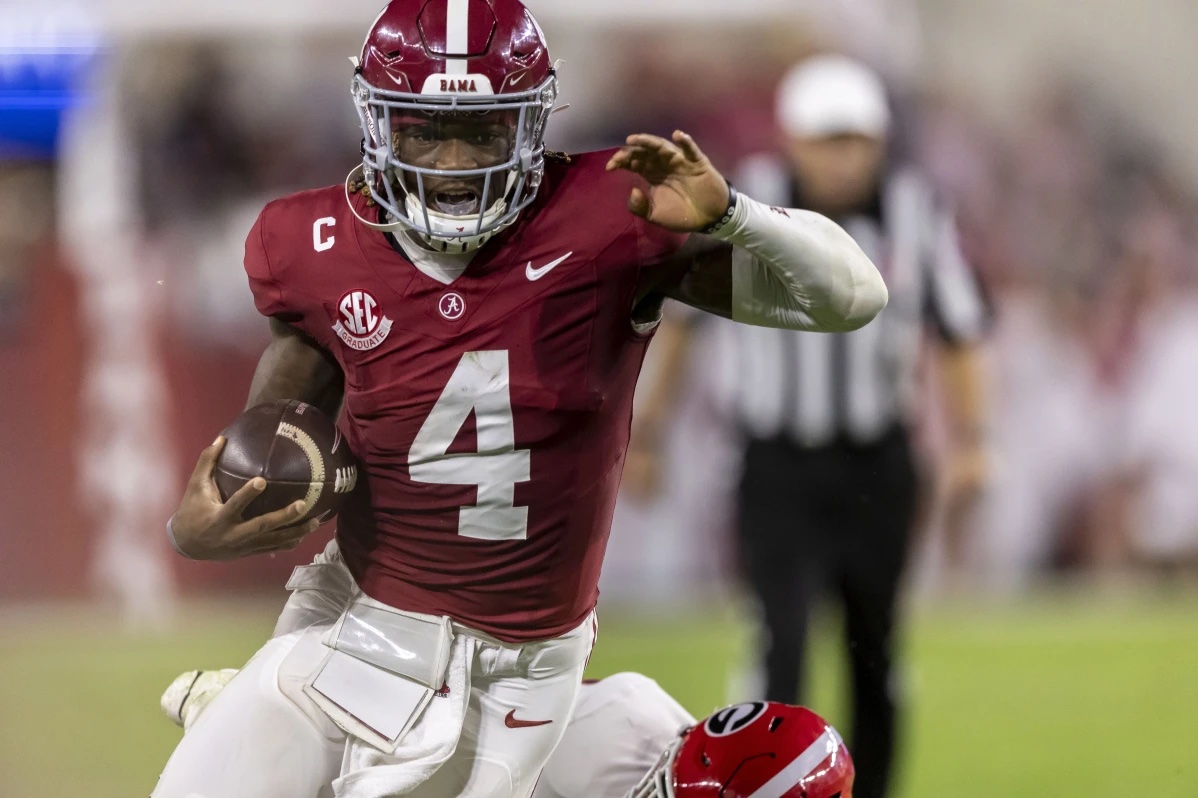 Alabama quarterback Jalen Milroe runs the ball for a touchdown against Georgia during the first half of an NCAA college football game, Saturday, Sept. 28, 2024, in Tuscaloosa, Ala.
