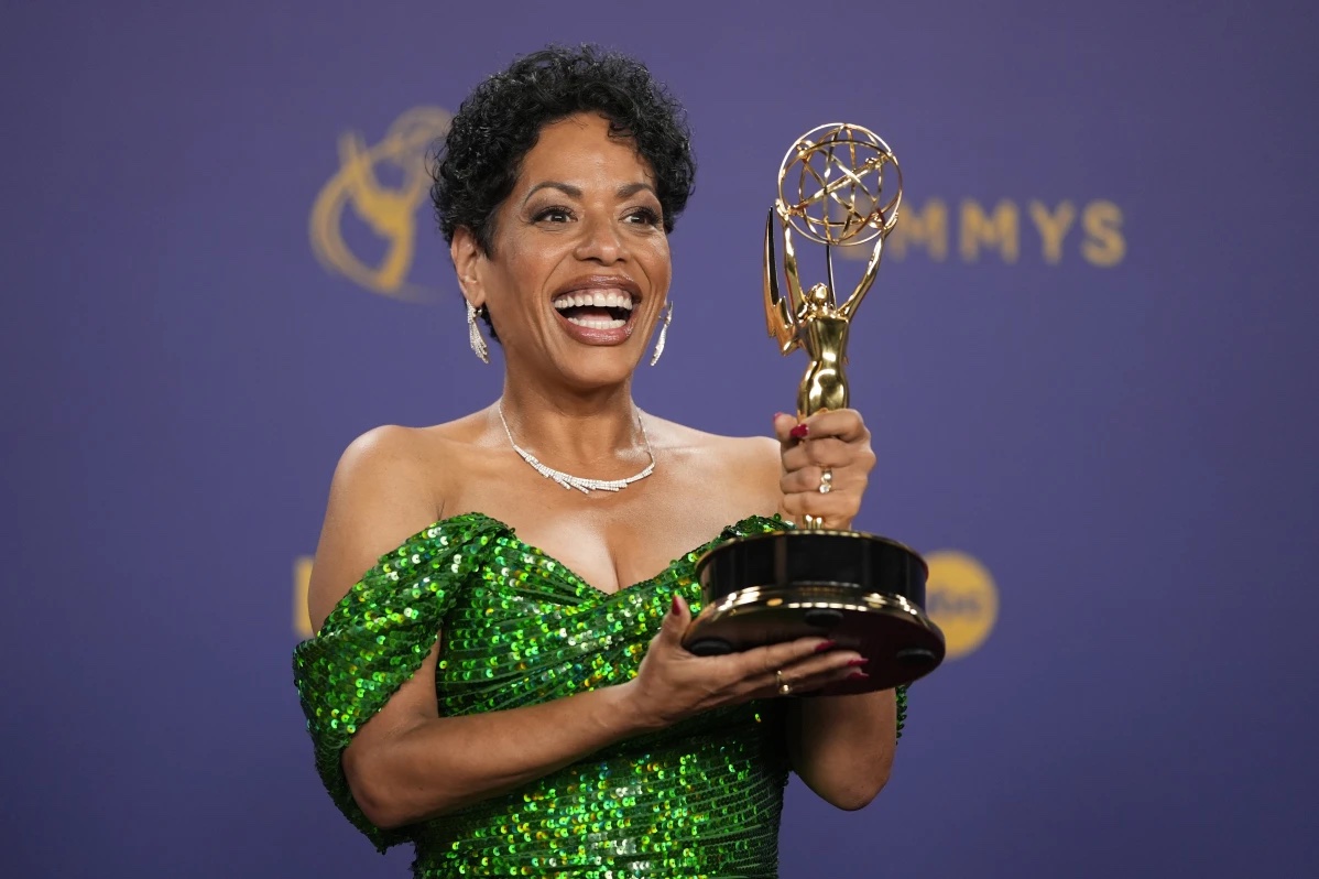 Liza Colon-Zayas poses in the press room with the award for outstanding supporting actress in a comedy series for “The Bear during the 76th Primetime Emmy Awards on Sunday, Sept. 15, 2024, at the Peacock Theater in Los Angeles.