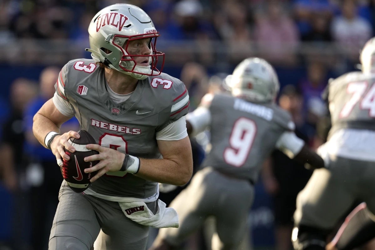 UNLV quarterback Matthew Sluka (3) looks to pass against Kansas in the first half of an NCAA college football game Friday, Sept. 13, 2024, at Children’s Mercy Park in Kansas City, Kan.