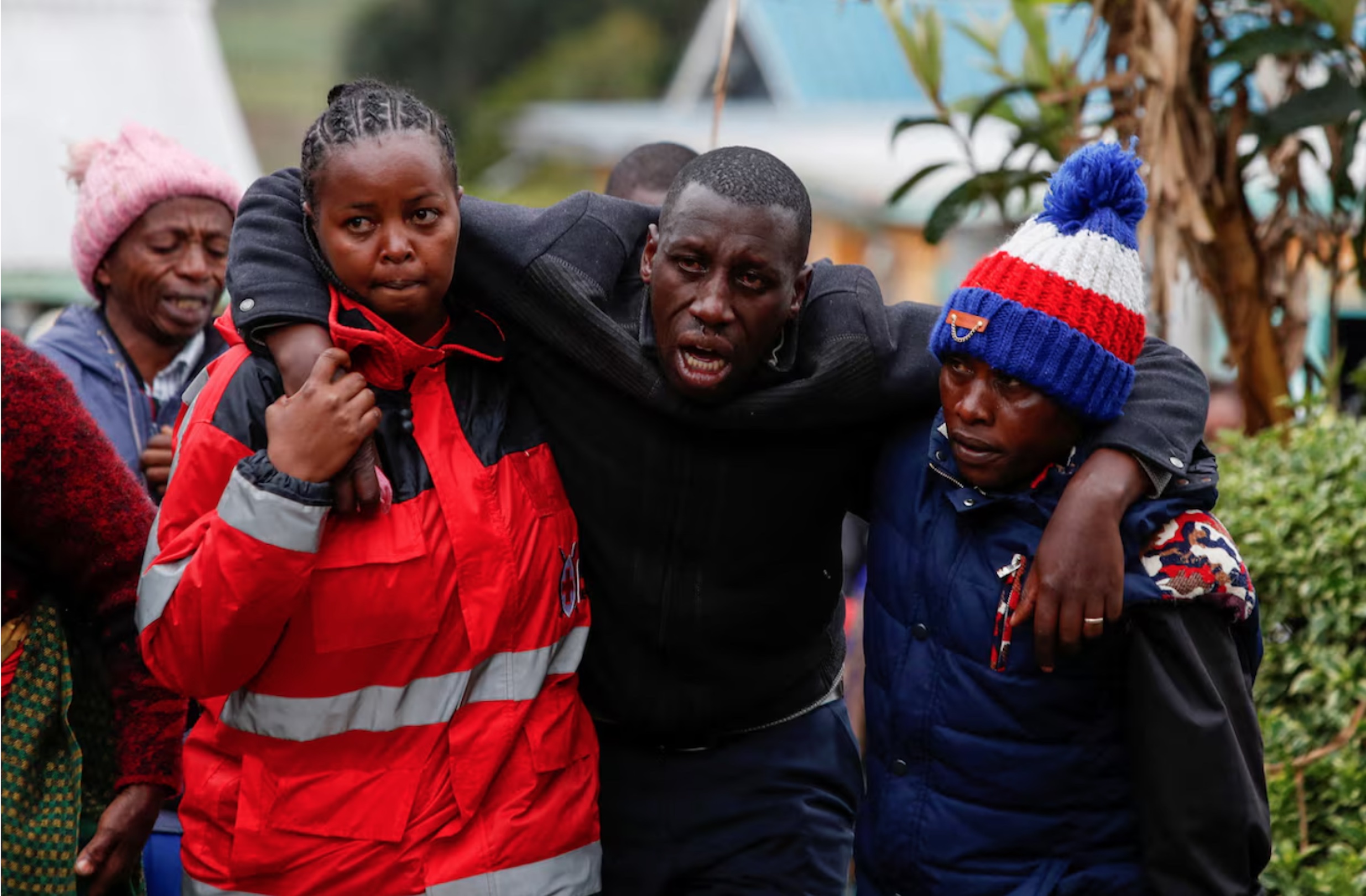Parents of pupils who died during a fatal fire react at the Hillside Endarasha Academy, in Kieni, Nyeri County, Kenya, September 6, 2024.