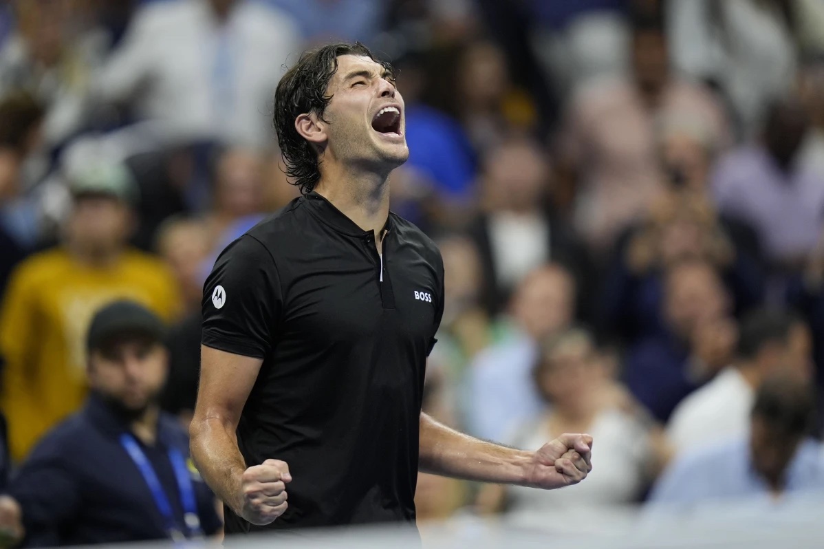Taylor Fritz, of the United States, reacts after defeating Frances Tiafoe, of the United States, during the men’s singles semifinals of the U.S. Open tennis championships, Friday, Sept. 6, 2024, in New York.
