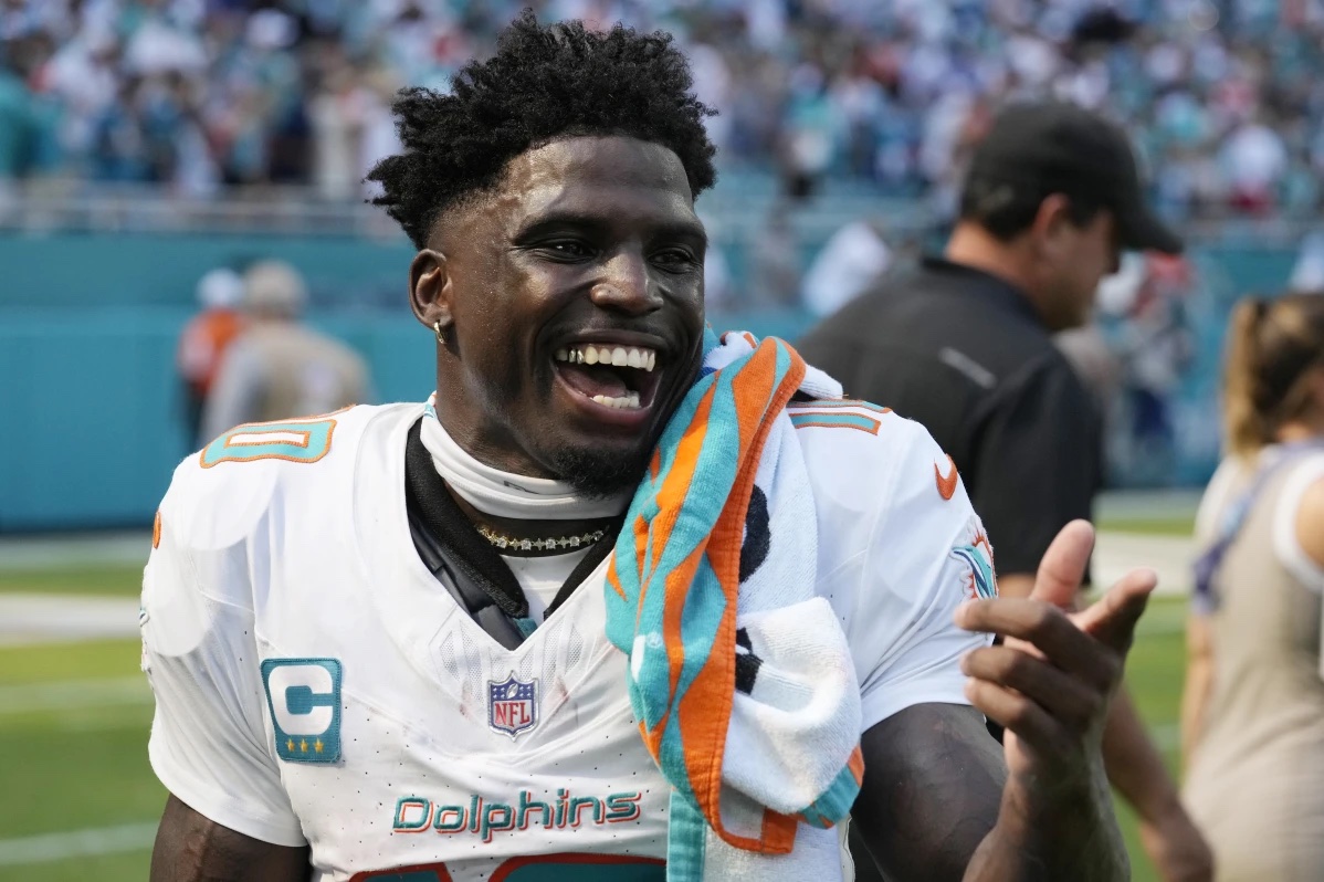 Miami Dolphins wide receiver Tyreek Hill gestures after an NFL football game against the Jacksonville Jaguars, Sunday, Sept. 8, 2024