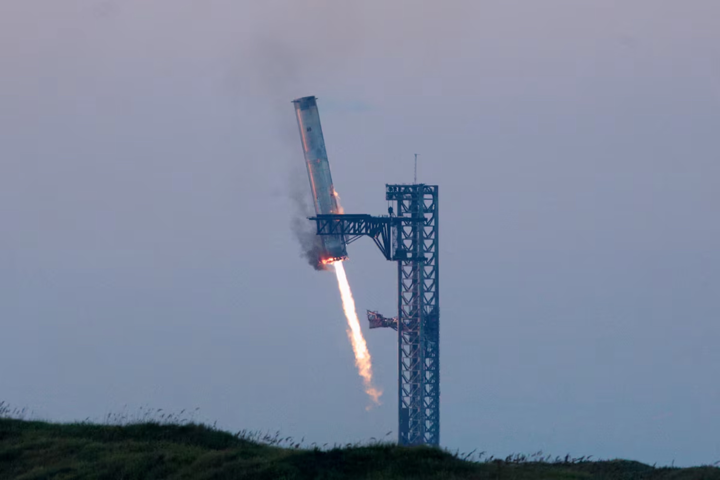 SpaceX's Super Heavy booster lands during SpaceX Starship's fifth flight test, in Boca Chica, Texas, U.S., October 13, 2024.