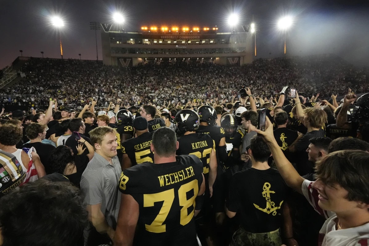Vanderbilt celebrates the team’s 40-35 win against Alabama on the field after an NCAA college football game Saturday, Oct. 5, 2024, in Nashville, Tenn.
