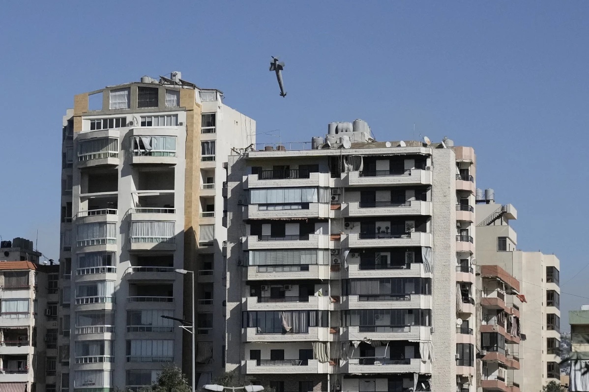 CAPTION CORRECTS TYPE OF MUNITION A bomb dropped from an Israeli jet hits a building in Ghobeiri, Beirut, Lebanon, Tuesday, Oct. 22, 2024.