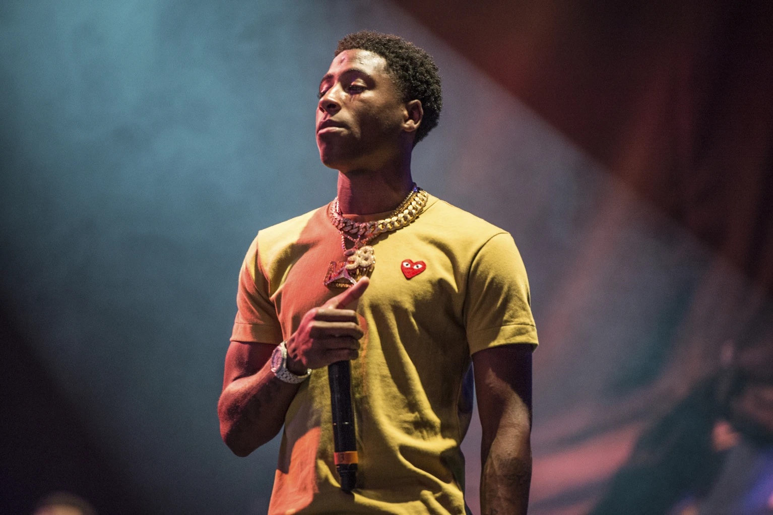 In this Aug. 25, 2017, file photo, NBA YoungBoy performs at the Lil’ WeezyAna Fest at Champions Square in New Orleans.