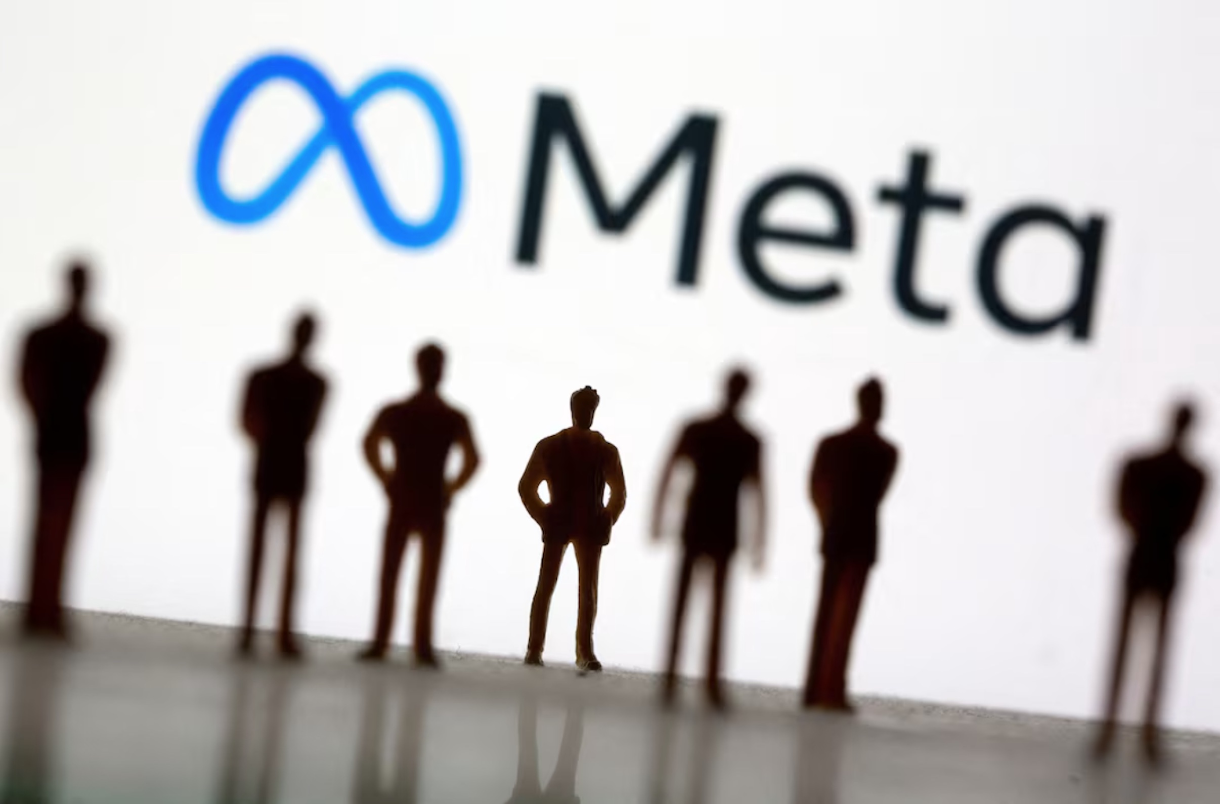 Small toy figures are seen in front of Meta's logo in this illustration taken, October 28, 2021.