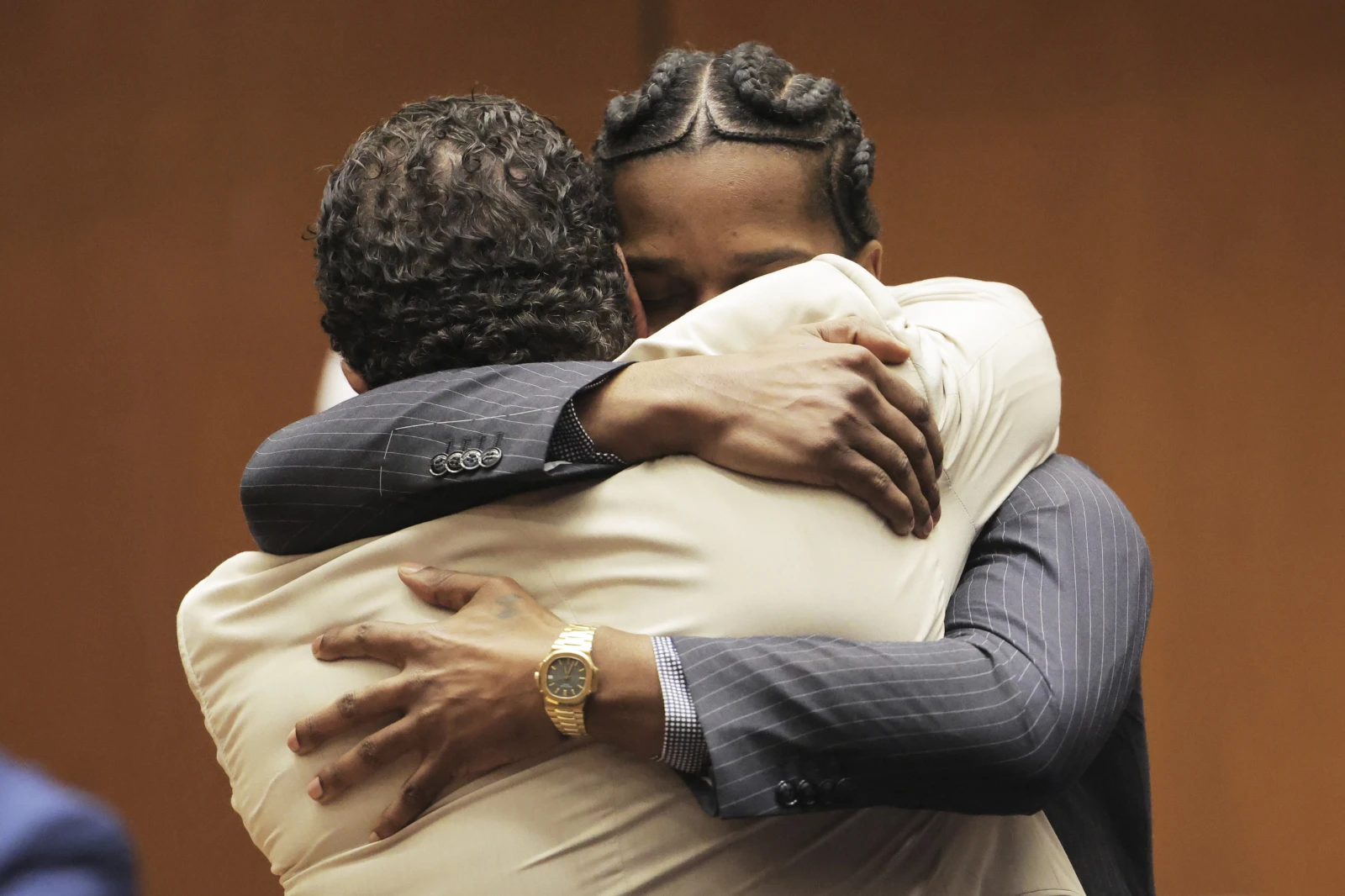 A$AP Rocky hugs attorney Joe Tacopina after he was found not guilty during his trial Tuesday, Feb. 18, 2025, in Los Angeles.