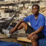 Ghana’s first-ever female world boxing champion, Abigail Kwartekaa Quartey, poses for a photo after a morning training session on the beach in the Jamestown district of Accra, Ghana, Wednesday, Jan 22, 2025.
