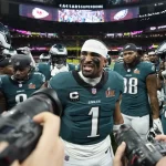 Philadelphia Eagles quarterback Jalen Hurts (1) huddles up his teammates prior to the NFL Super Bowl 59 football game against the Kansas City Chiefs, Sunday, Feb. 9, 2025, in New Orleans.