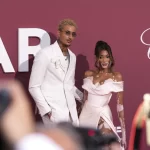 Kyle Kuzma, left and Winnie Harlow pose for photographers upon arrival at the amfAR Cinema Against AIDS benefit at the Hotel du Cap-Eden-Roc, during the 77th Cannes international film festival, Cap d’Antibes, southern France, May 23, 2024.