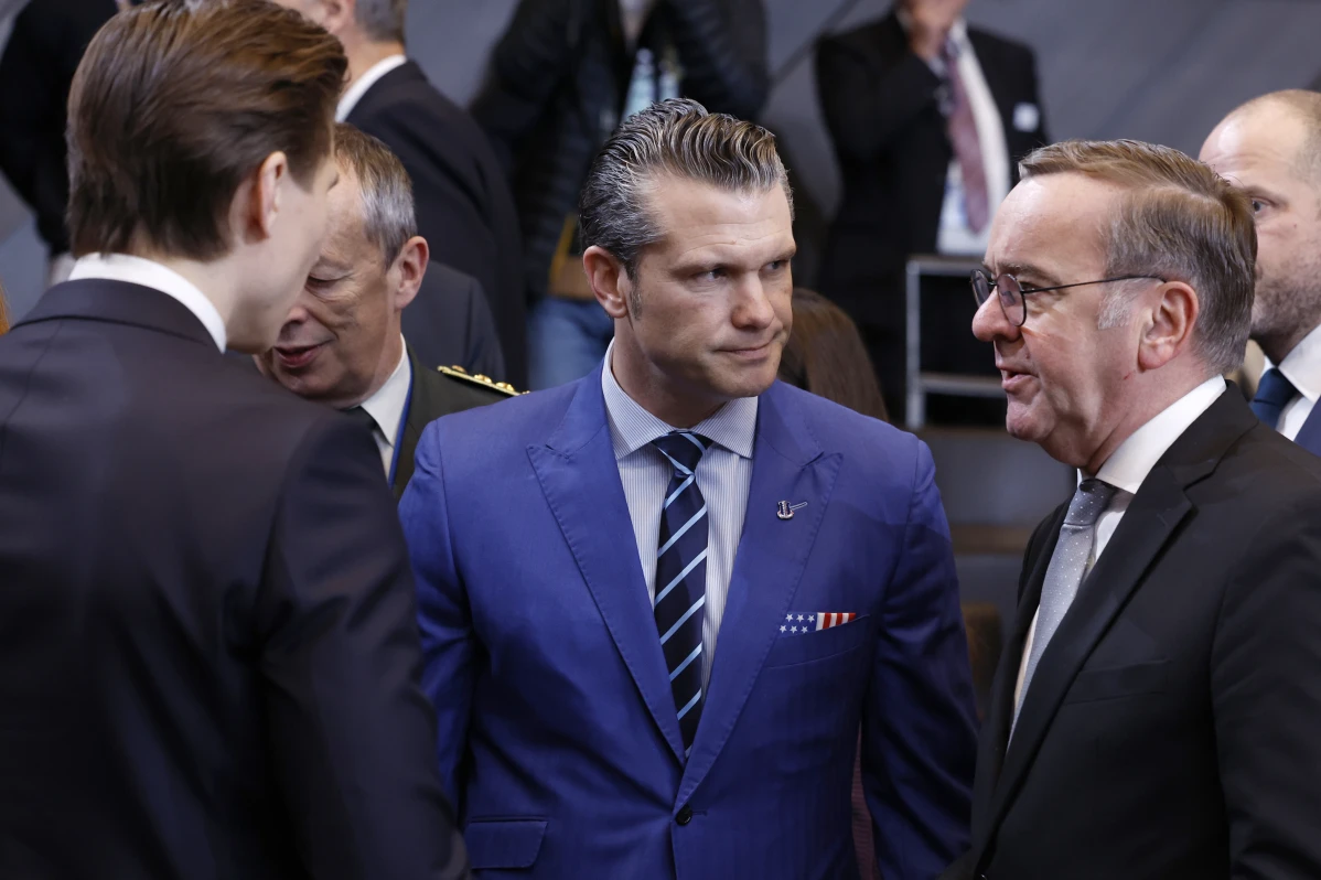 United States Secretary of Defense Pete Hegseth, center, speaks with Germany’s Defense Minister Boris Pistorius, right, and Finland’s Defense Minister Antti Hakkanen, left, during a meeting of the North Atlantic Council in defense ministers format at NATO headquarters in Brussels, Thursday, Feb. 13, 2025.