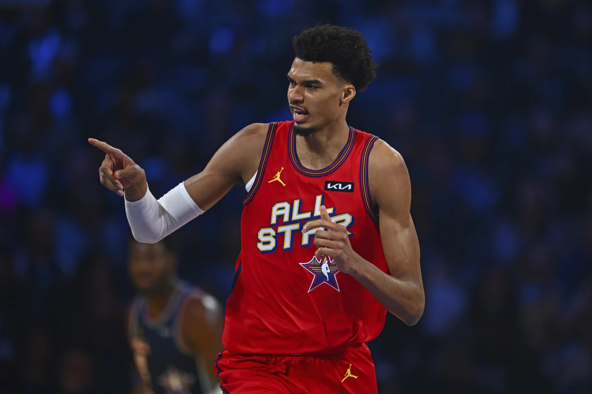 Chuck’s Global Stars’ Victor Wembanyama (1) gestures after sinking a basket against the Kenny’s Young Stars during Game 1 of the NBA All-Star Game at Chase Center in San Francisco, Sunday, Feb. 16, 2025.