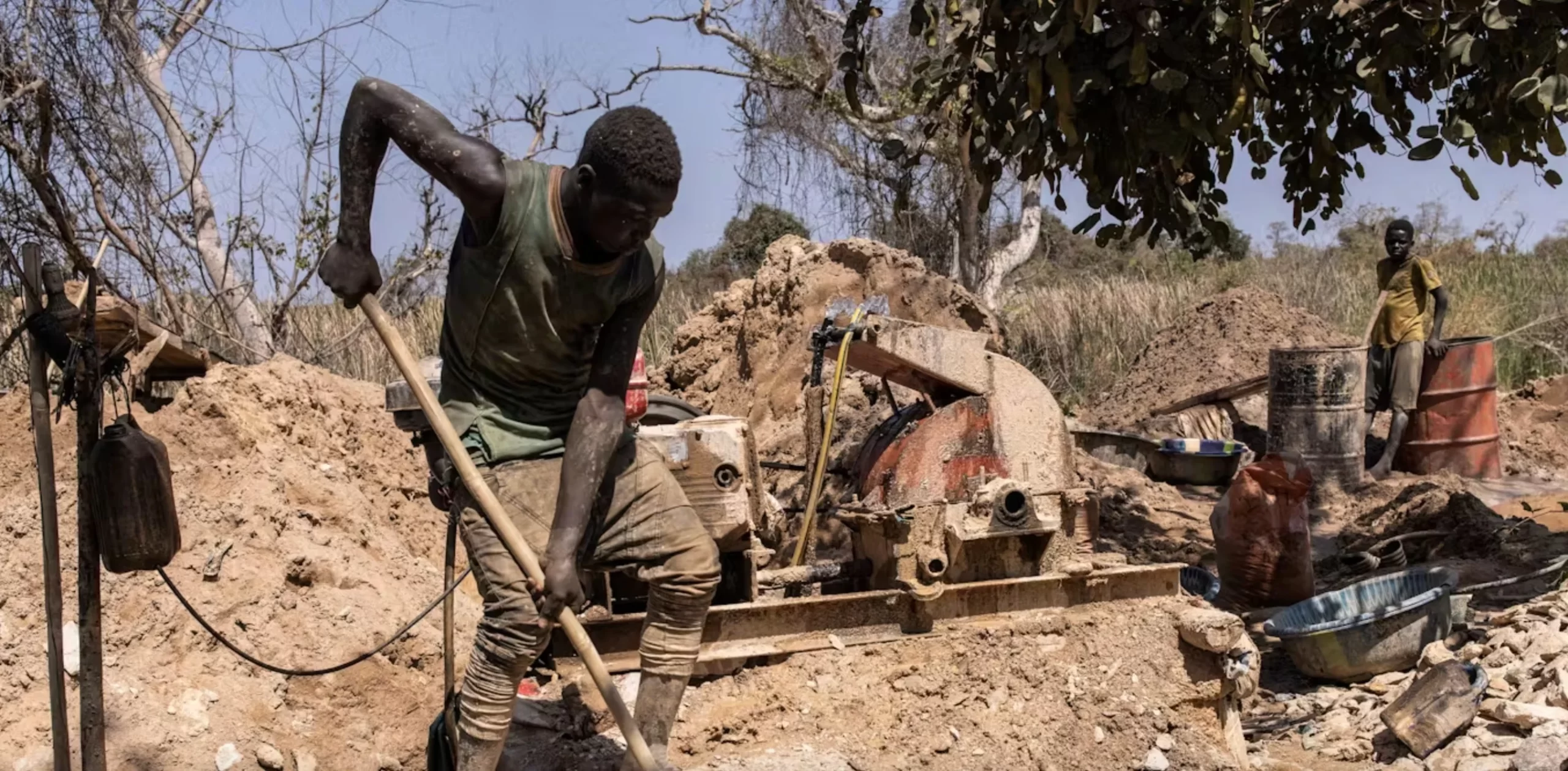 An artisanal gold miner digs for gold in the Bantakokouta mine.