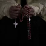 A Catholic woman attends a nightly rosary prayer service for the health of Pope Francis in St. Peter’s Square at the Vatican, Wednesday, Feb. 26, 2025.