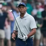 Tiger Woods walks to the first green during a practice for the Masters golf tournament at Augusta National Golf Club, Tuesday, April 4, 2023, in Augusta, Ga.