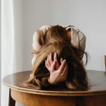 Woman lying on table