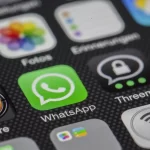 WhatsApp messaging app showing on phone screen.