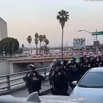 Cops mobilized in LA for the curfew.