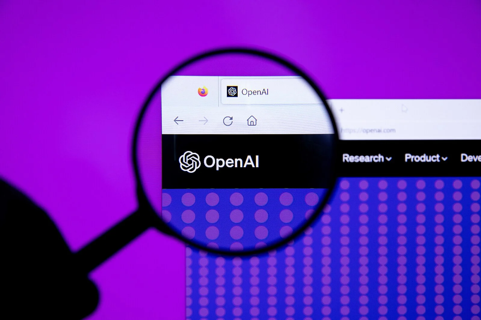 OpenAI logo with magnifying glass.