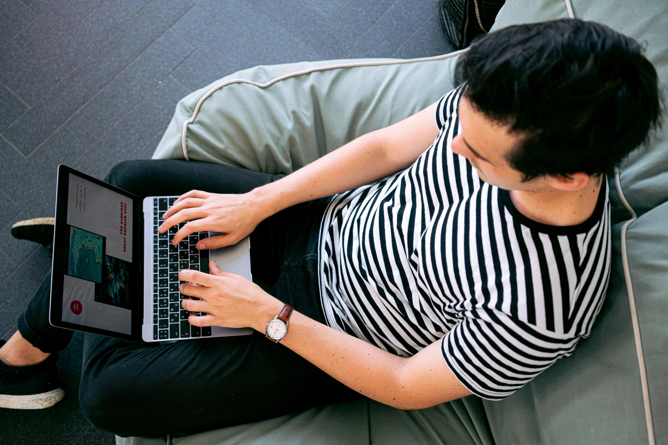 A man using a laptop. Image source: