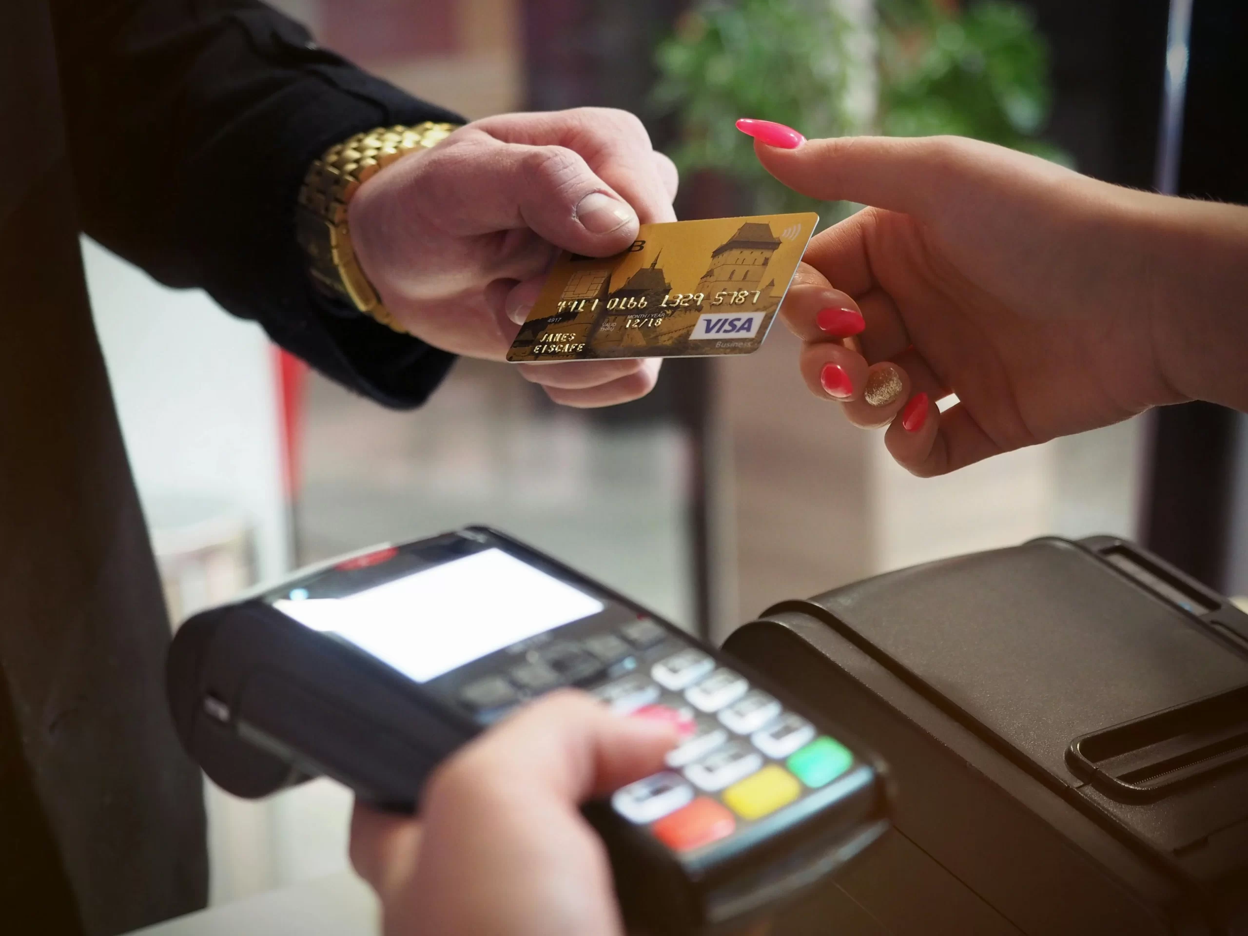A man using his card to make payment.