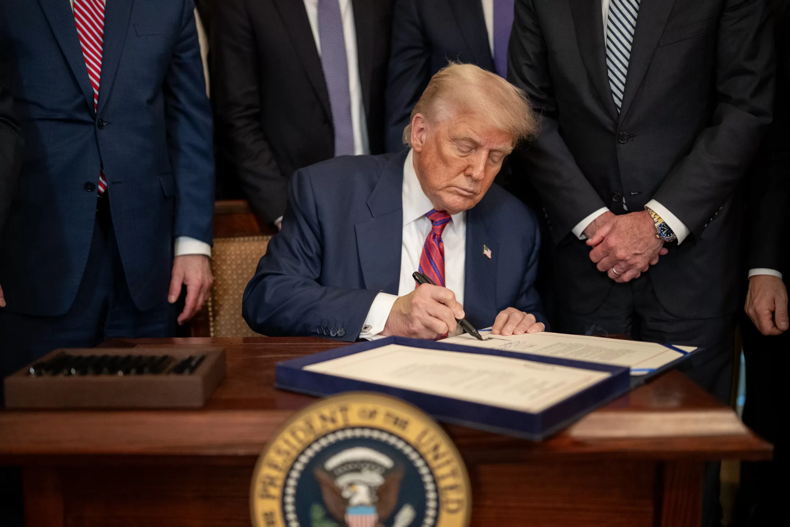 President Donald Trump signing a bill.