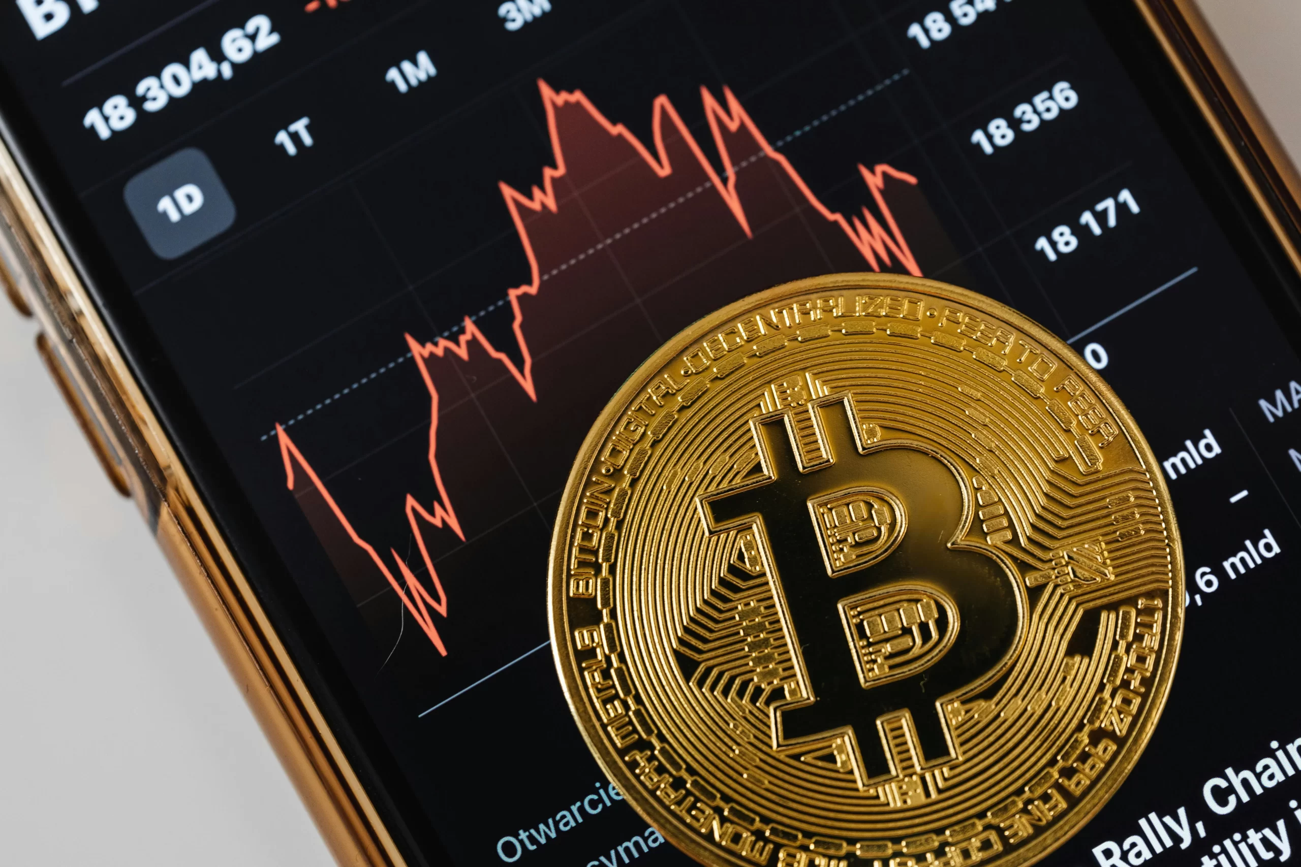 A Bitcoin on a smartphone screen.