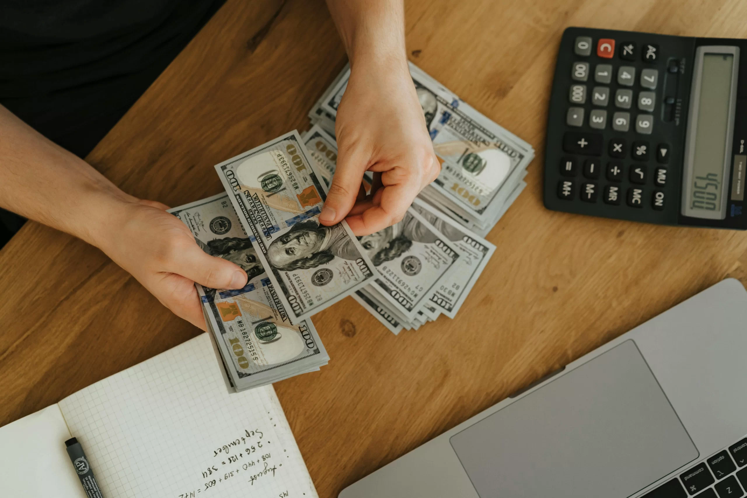A person counting money.