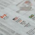 Countries economic statistics in newspaper.