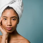 A woman showing her perfect skin.