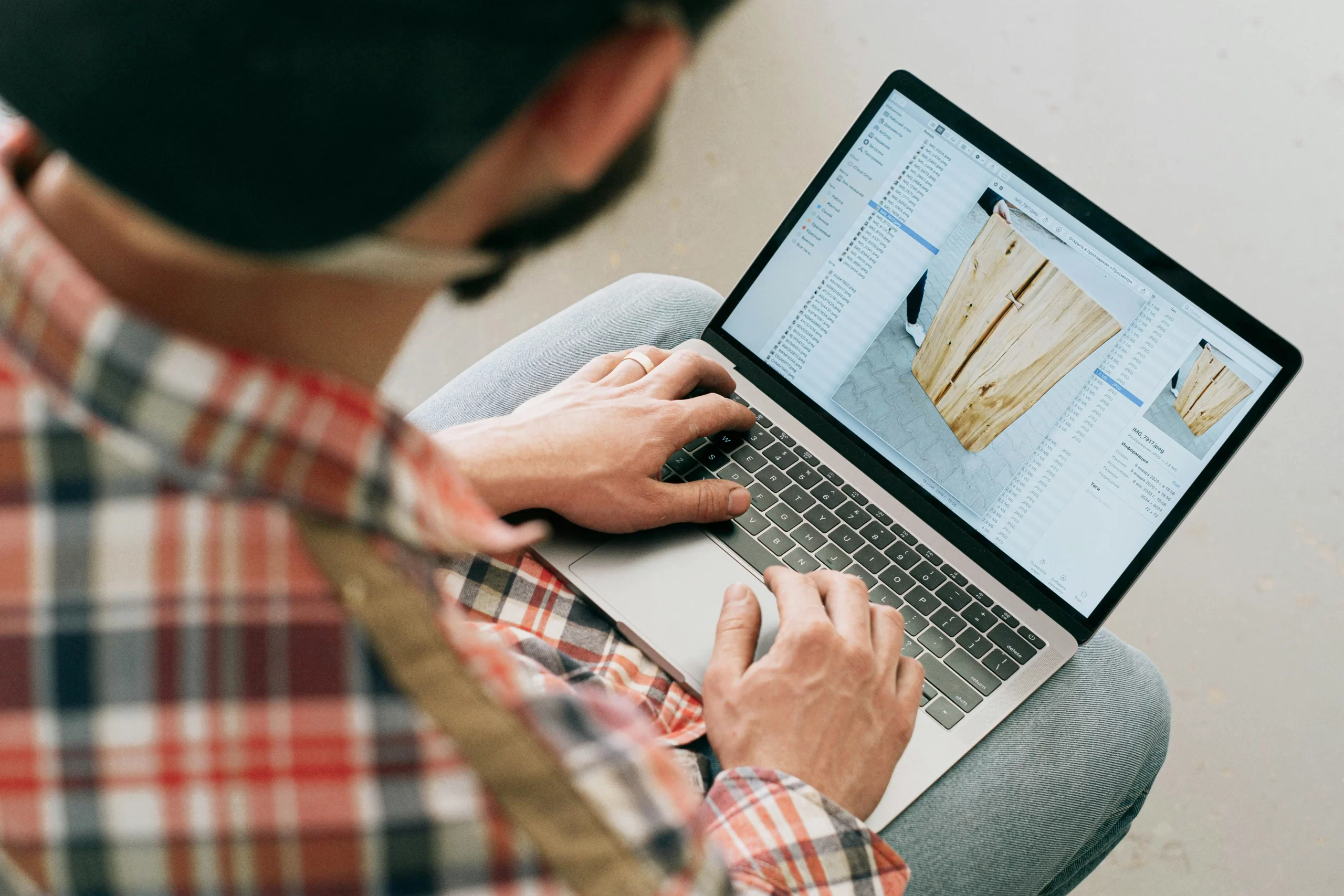A business owner using a laptop.