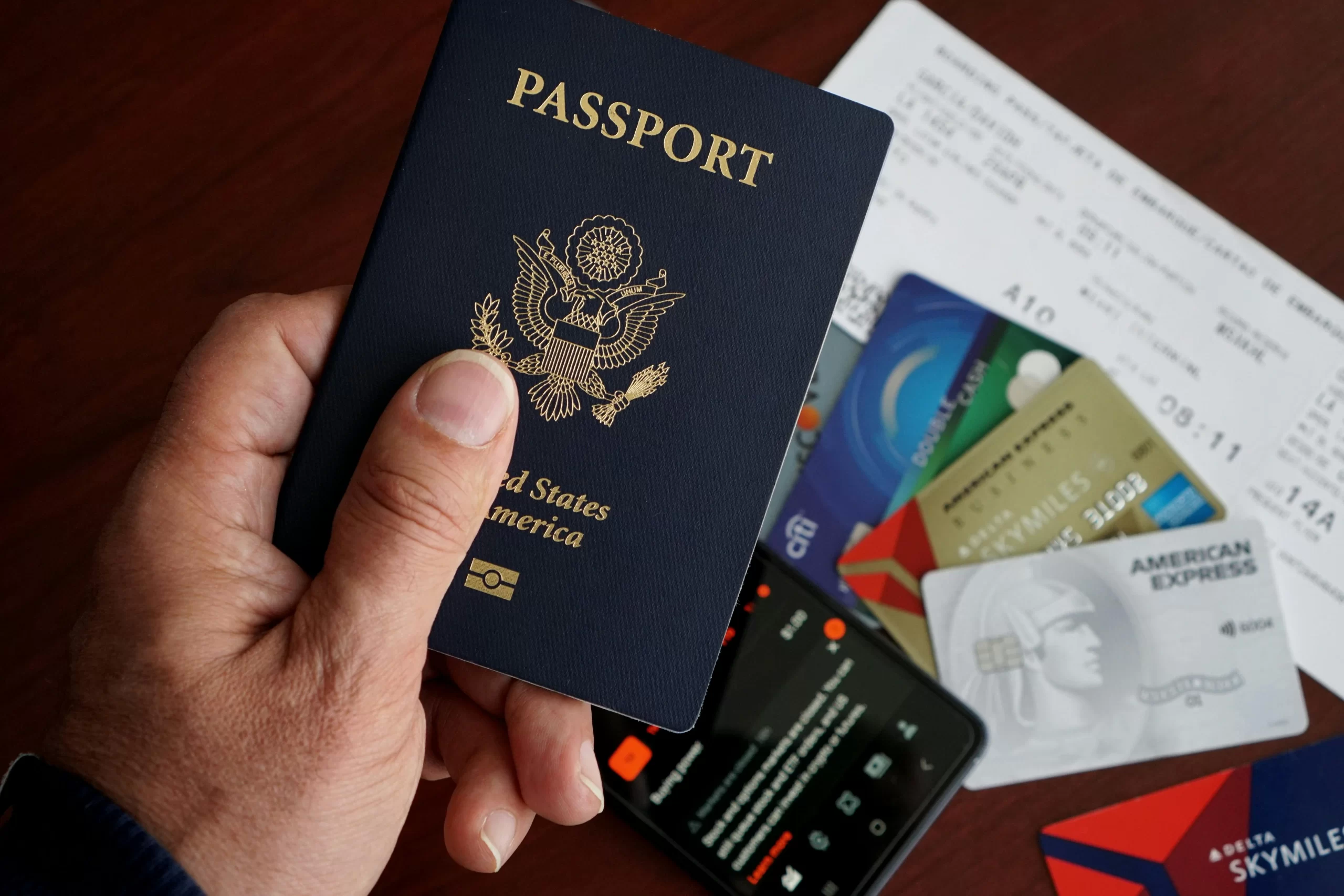 US passport with credit cards, tickets.