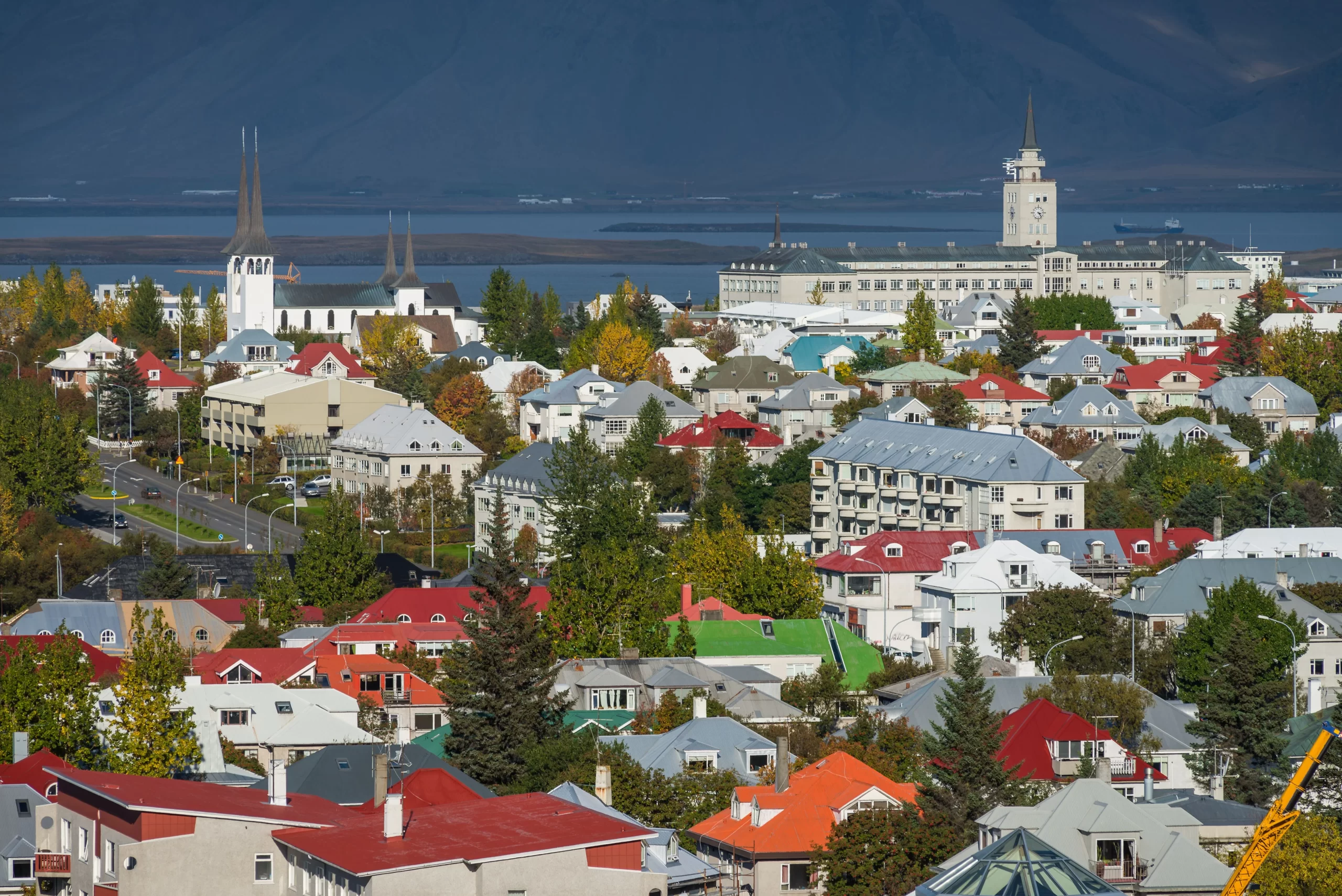 Aerial view of Reykjavik featuring colorful rooftops and iconic architecture - Iceland.